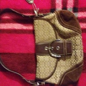 Official Coach purse was used but looks brand new